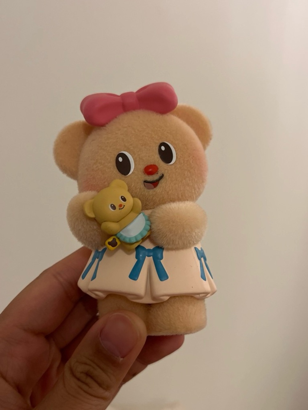 Cute Flocked Bear Figurine with Pink Bow and Cream Dress